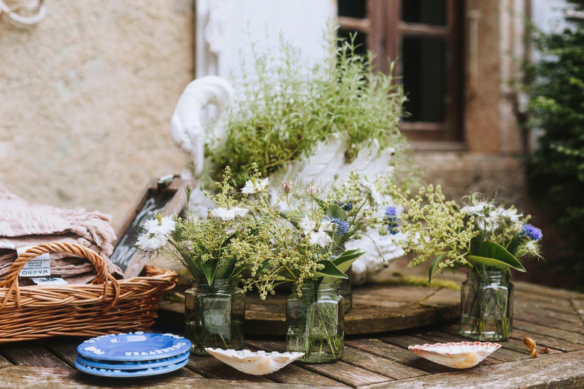 wildflowers in jars as french countryside 