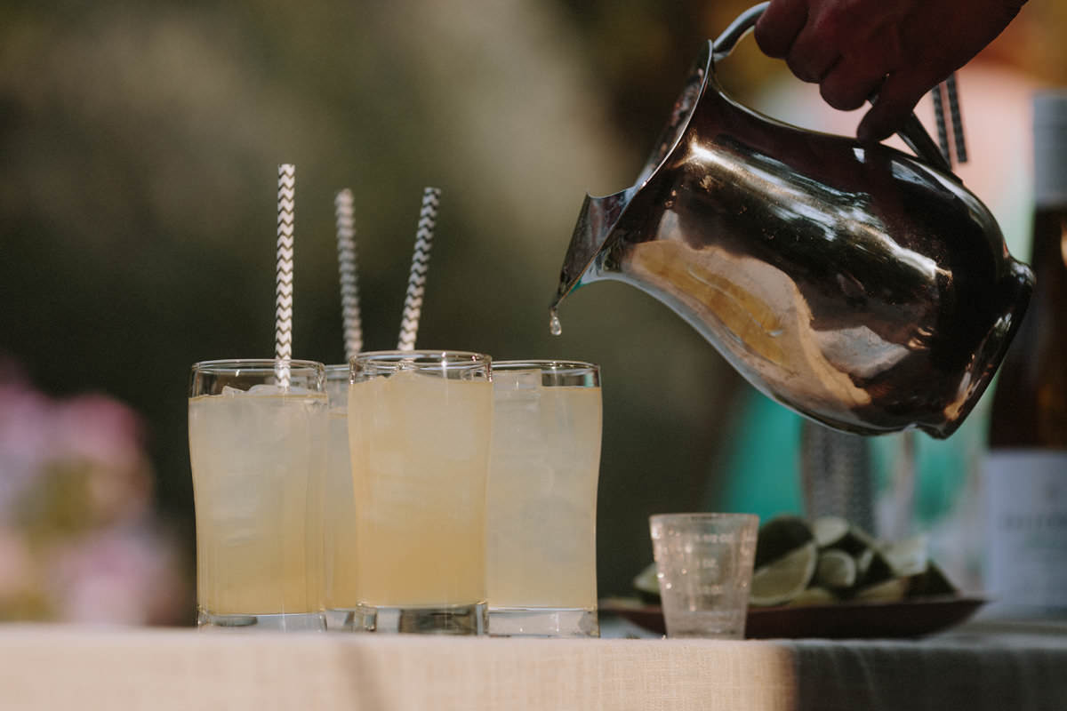 lemonade served at wedding with chevron paper straws