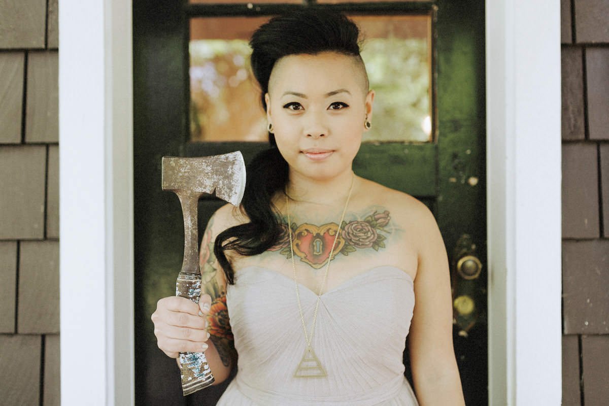 tattooed bridesmaid holding hatchet squamish