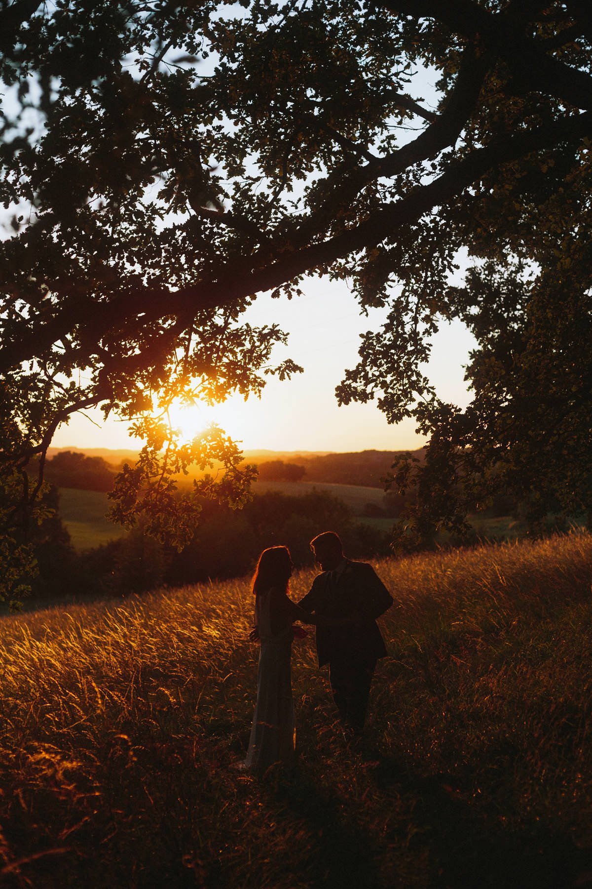 wedding couple enjoying sunset in the french countryside