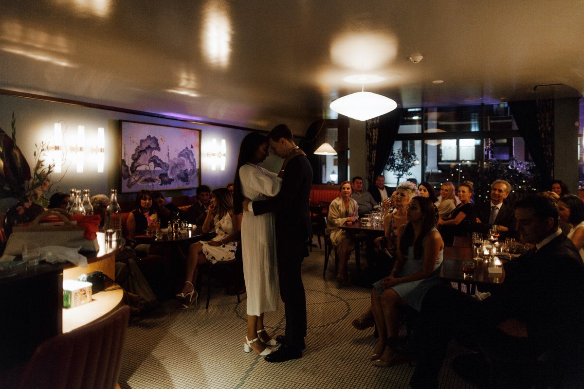 wedding couple share a first dance inside kissa tanto