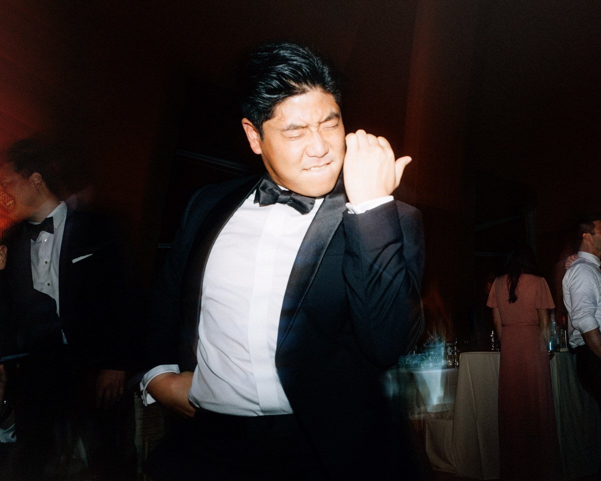 groomsman having a good time on the dance floor