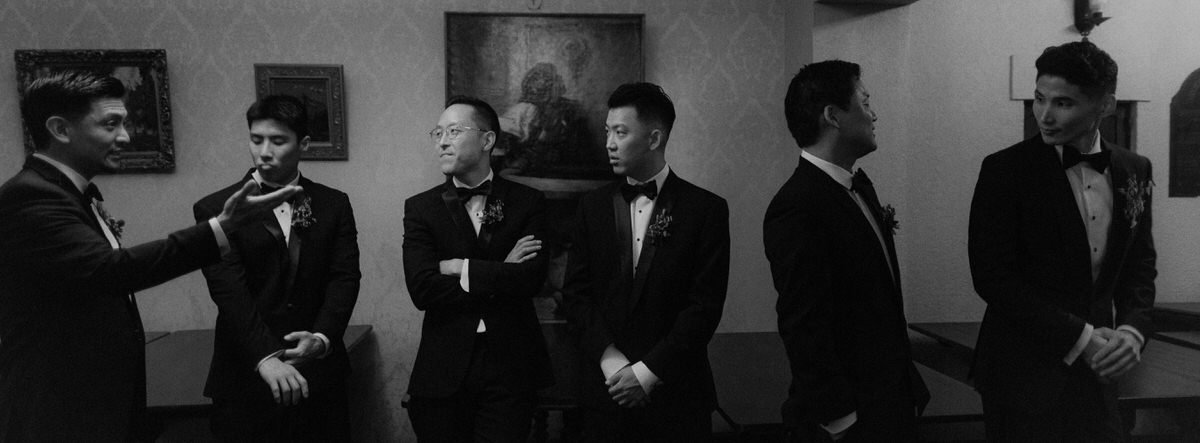 documentary style capture of wedding party waiting for the ceremony to begin inside the Ebell of LA