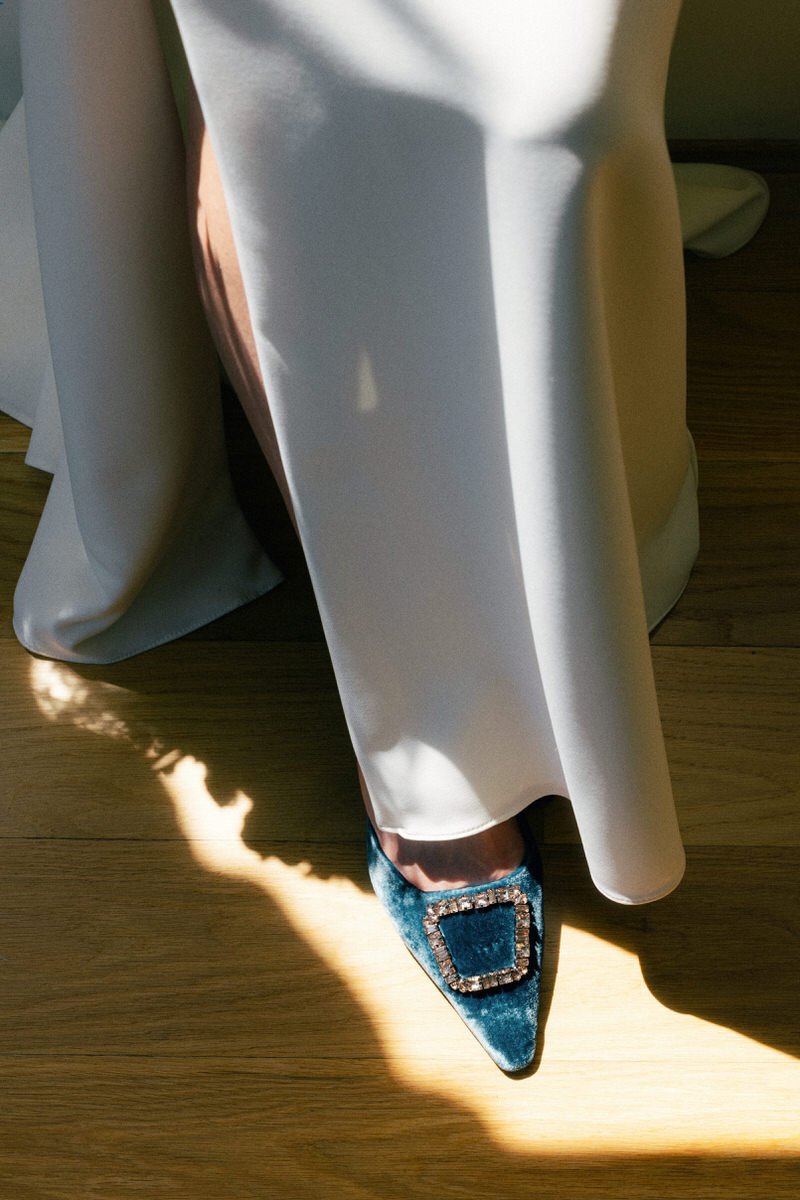 detail of pointed blue velvet shoes by Sam Edelman