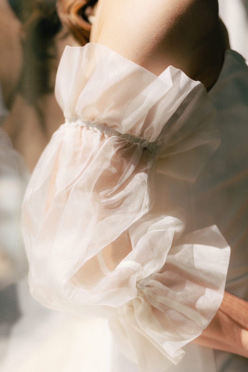detail of ruffled sleeve of Sarah Seven dress