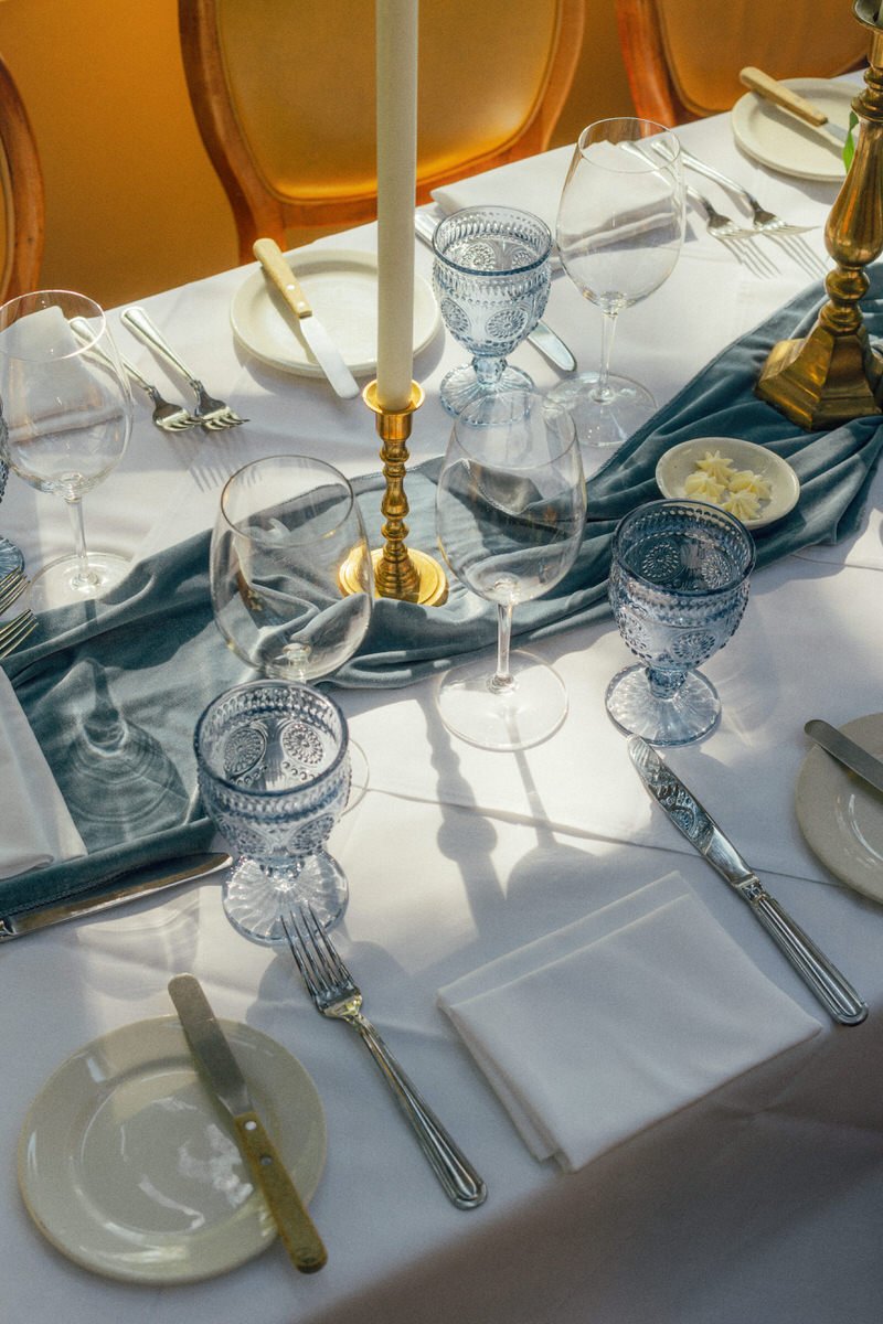 blue tablescape with gold accents