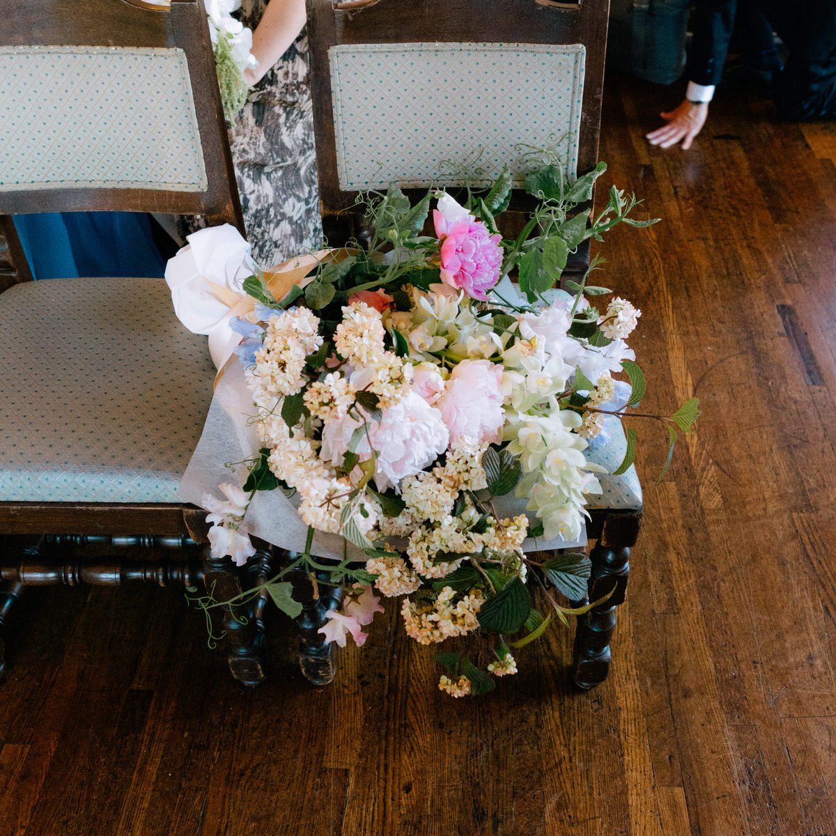 large floral bouquet with peonies and sweet peas