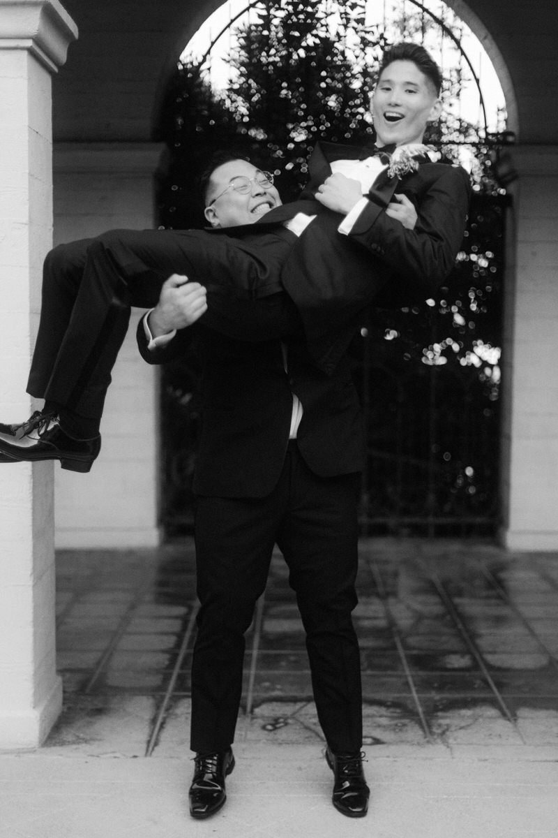 groom being held up by groomsman at the Ebell of LA