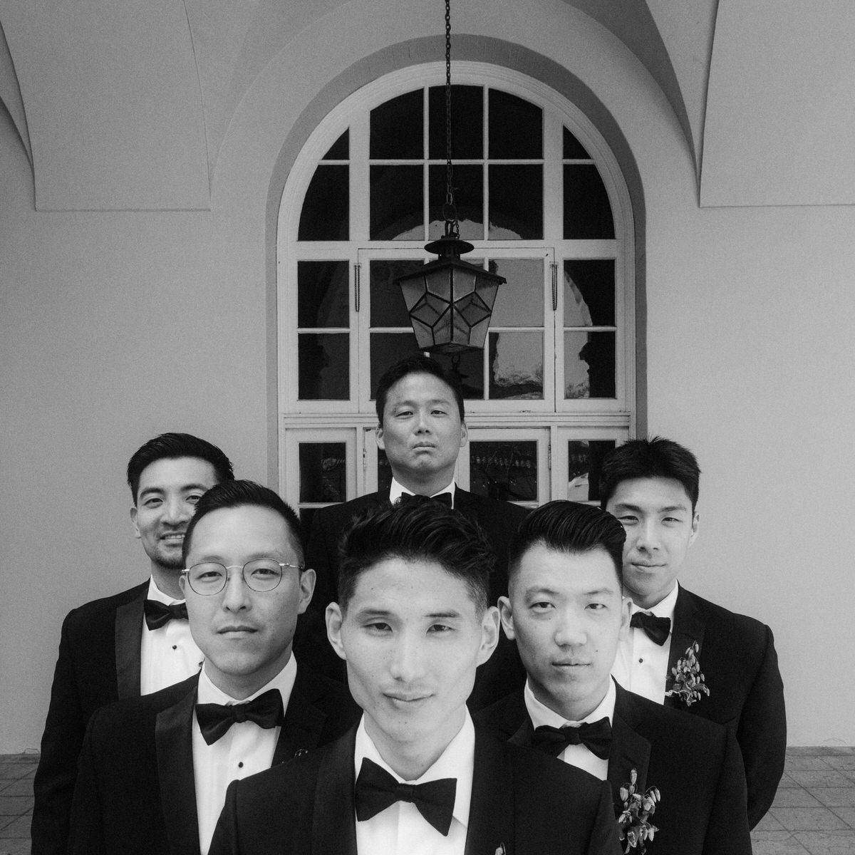 creative composition of groom posing with his groomsmen at the Ebell of LA
