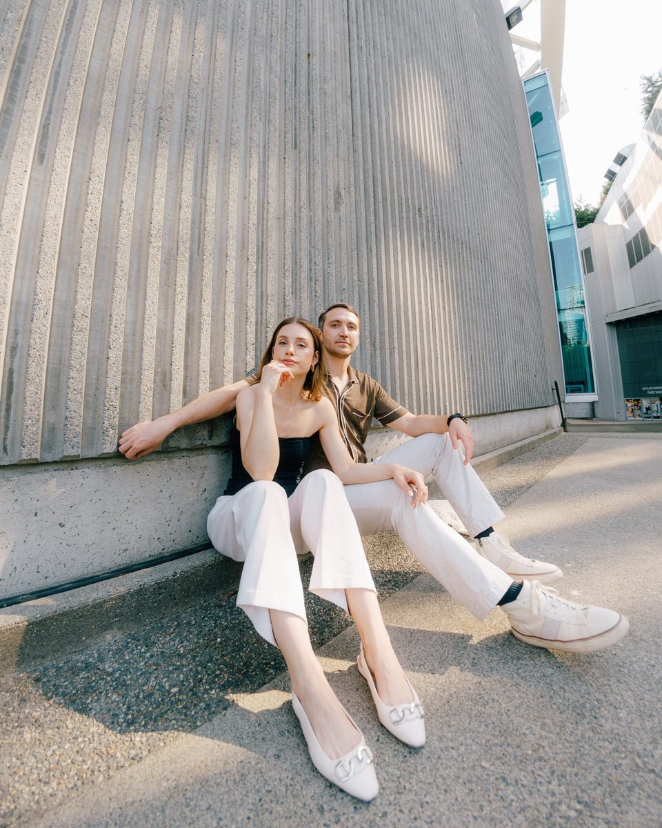 editorial style wide angle photo of couple during casual engagement session in Vancouver