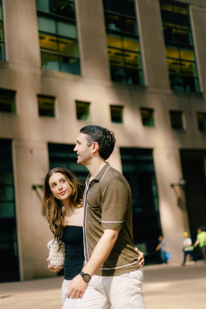 editorial style photo of engaged couple at Vancouver Central Library