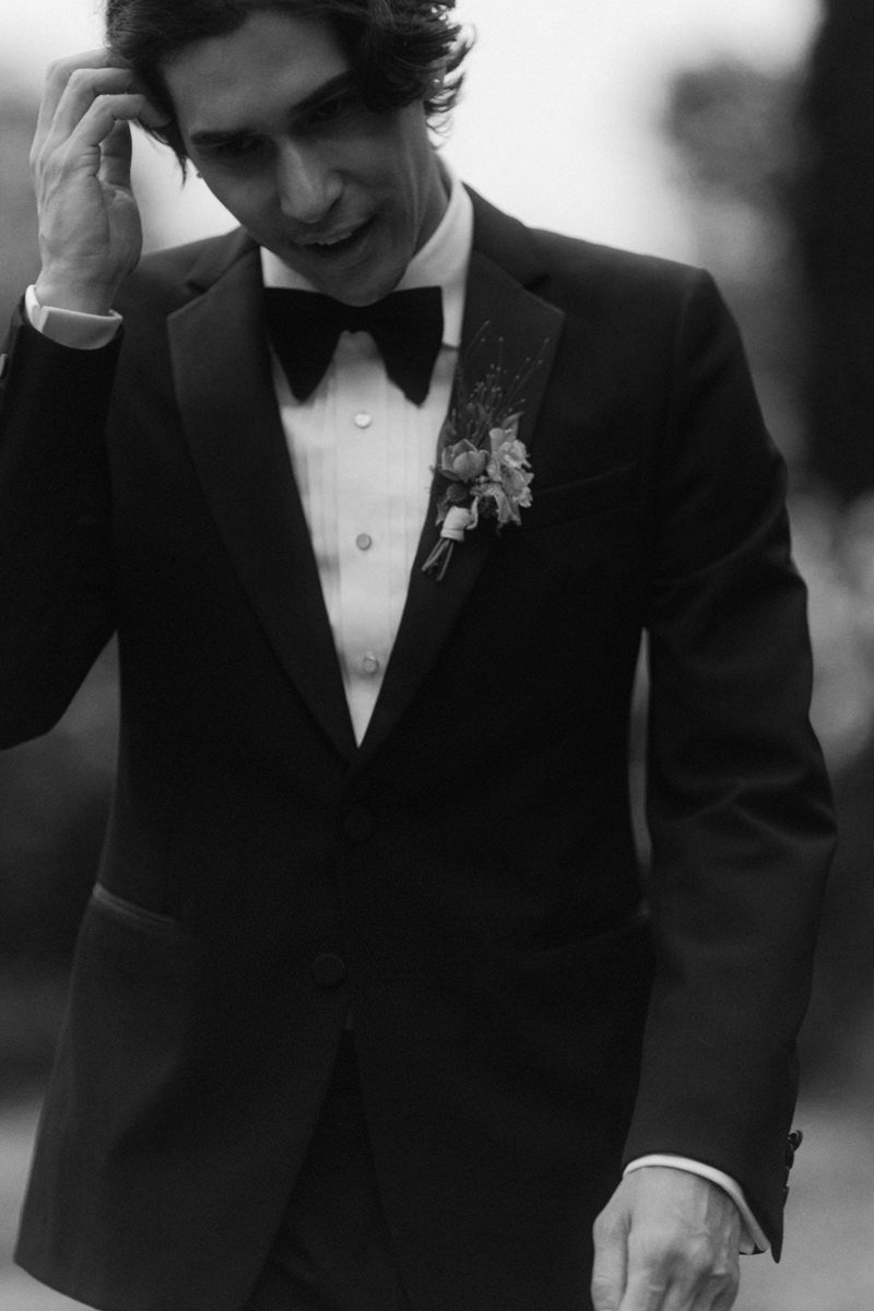 editorial style photo of groom on wedding day