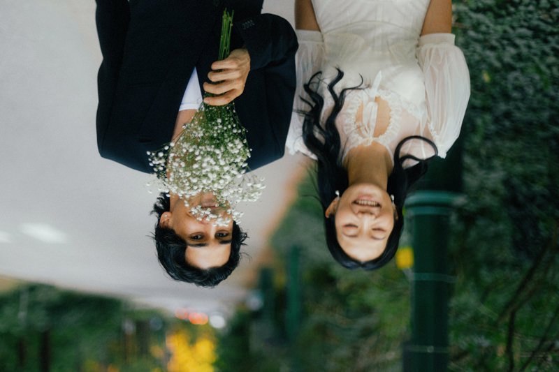 fashionable couple posing casually during engagement session