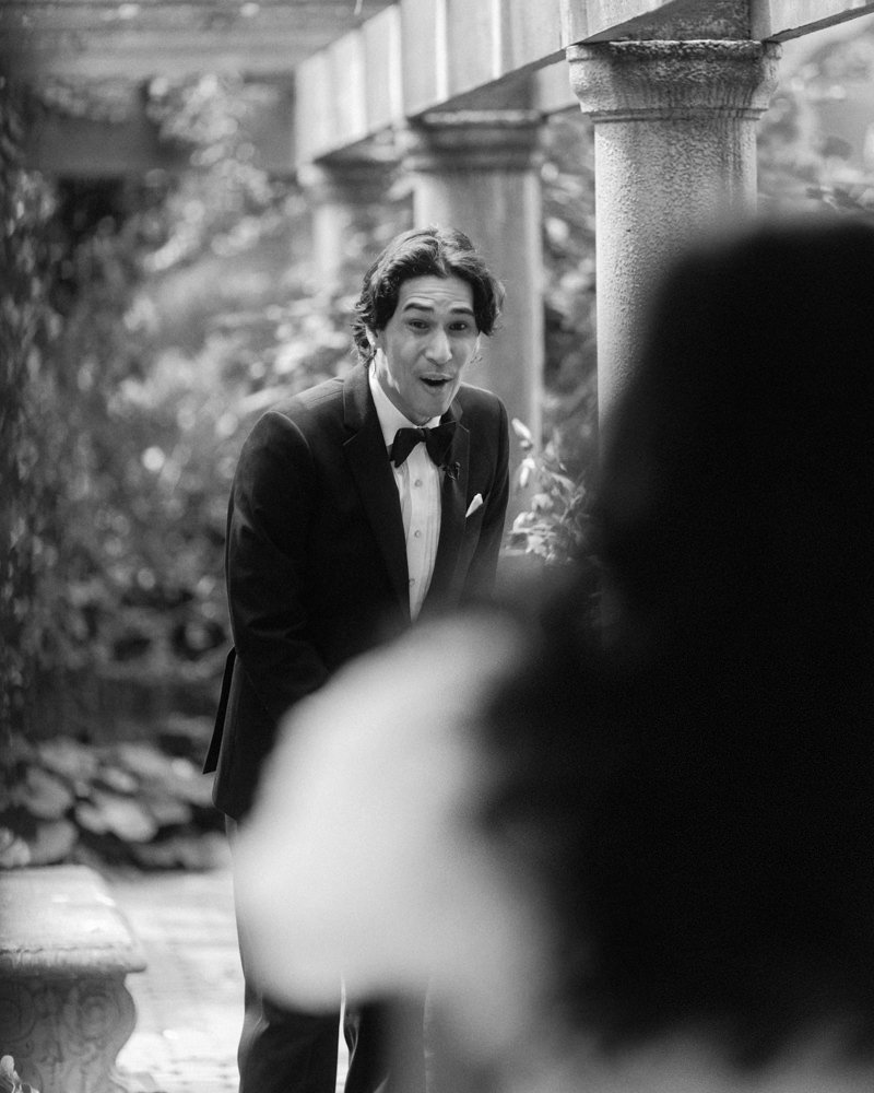 groom thrilled to see his bride during first look