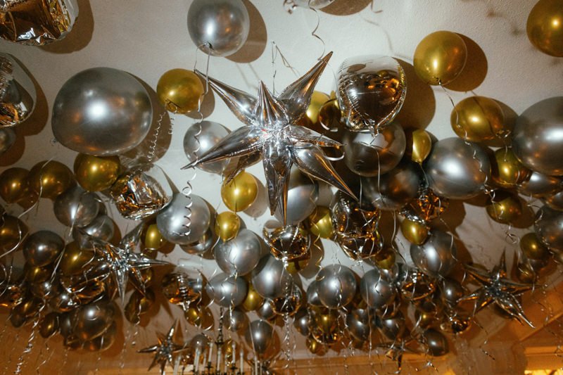 gold and silver balloon decorations for the dance floor