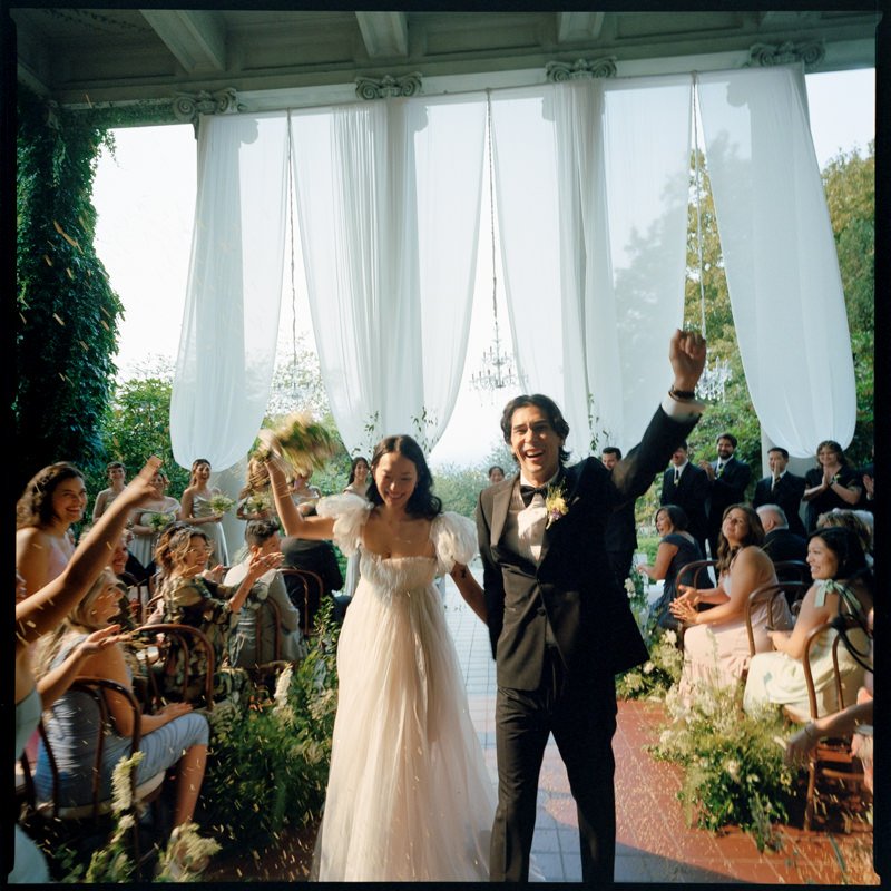 wedding couple celebrating being just married at hycroft manor
