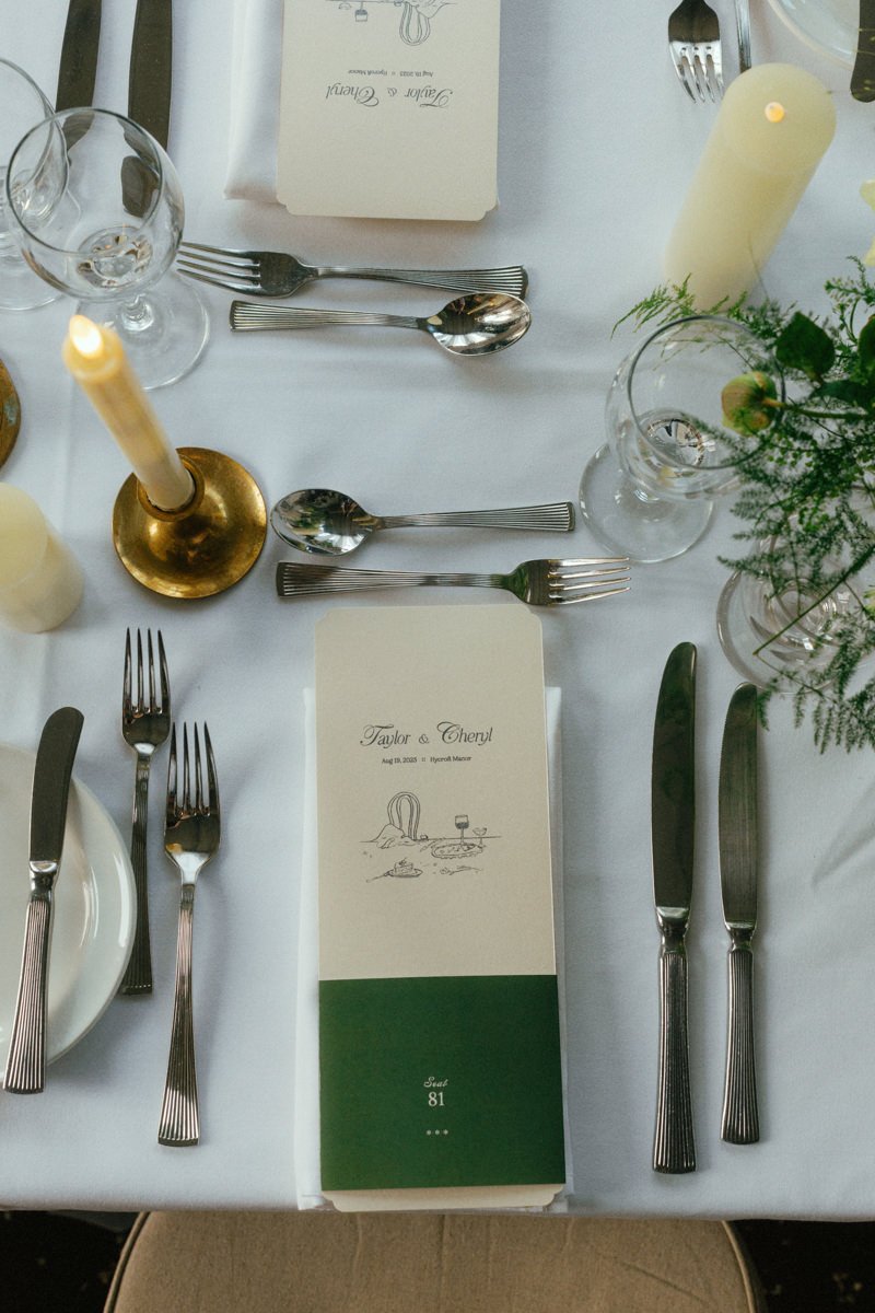 table setting with seat number and menu designed by the wedding couple