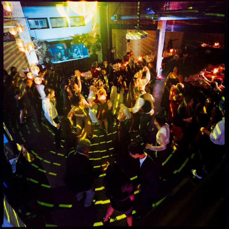 120mm film medium format photo of wedding guests partying on the dance floor at Withinsodo Seattle