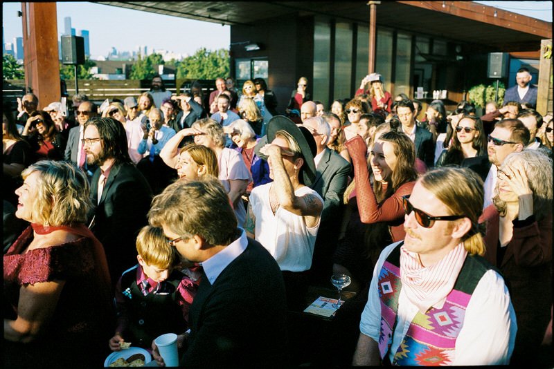35mm film photo of guests enjoying a wedding ceremony at Withinsodo Seattle