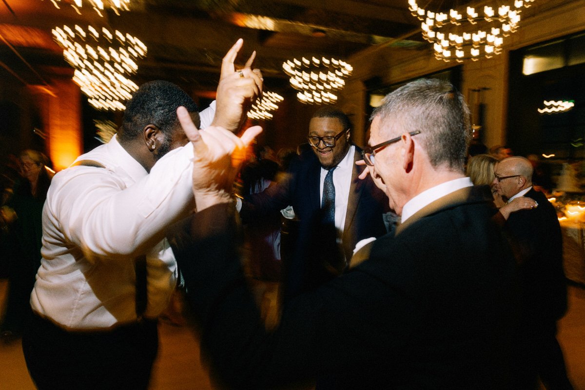 father of the bride dancing with wedding guests at the Switch House by Cescaphe