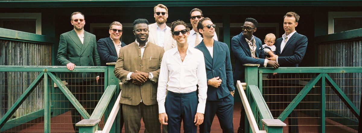 35mm film photo of fashionable groom and groomsmen outside their room at Hana Maui Resort