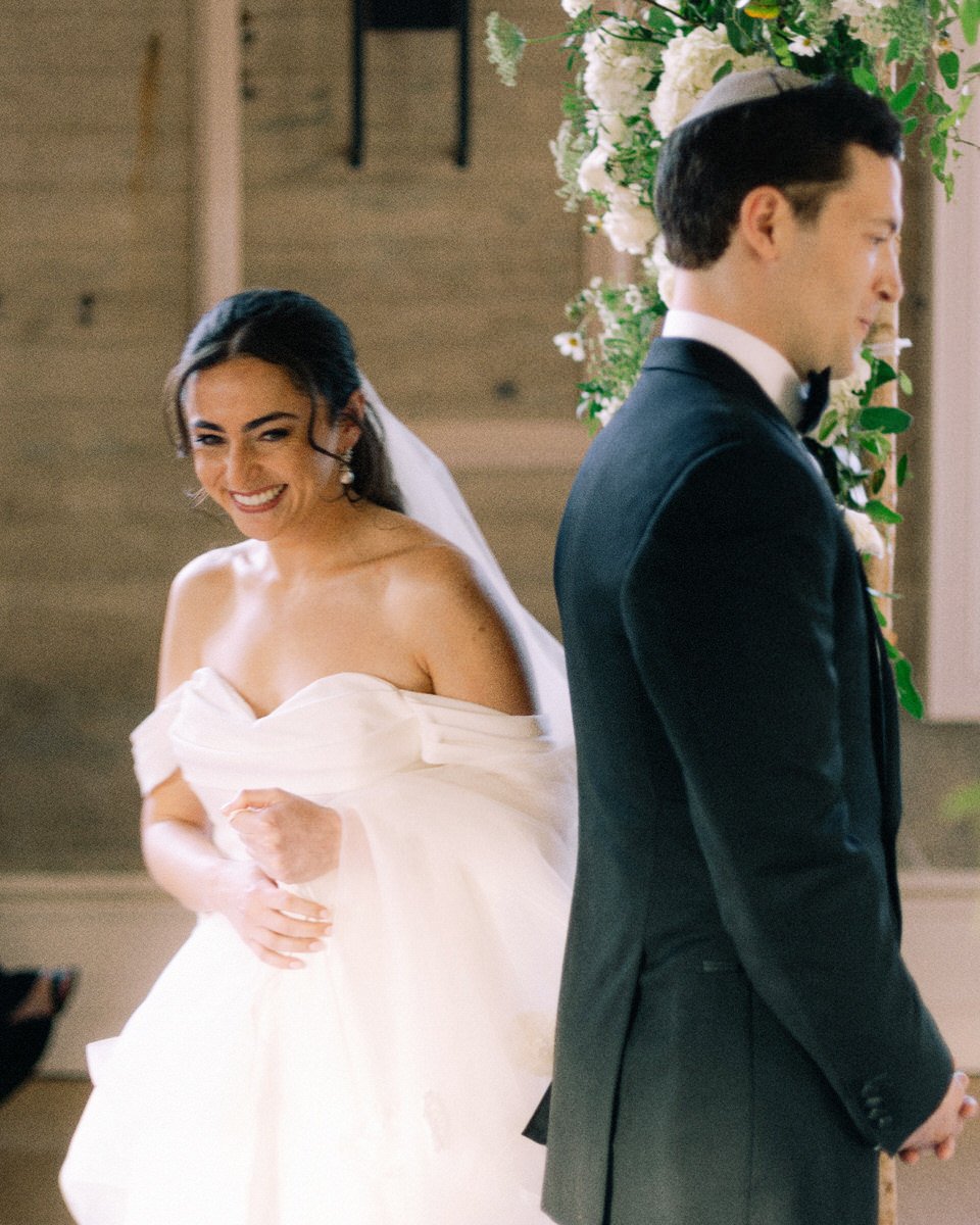 bride circling around the groom during Jewish Hakafot at the Switch House by Cescaphe