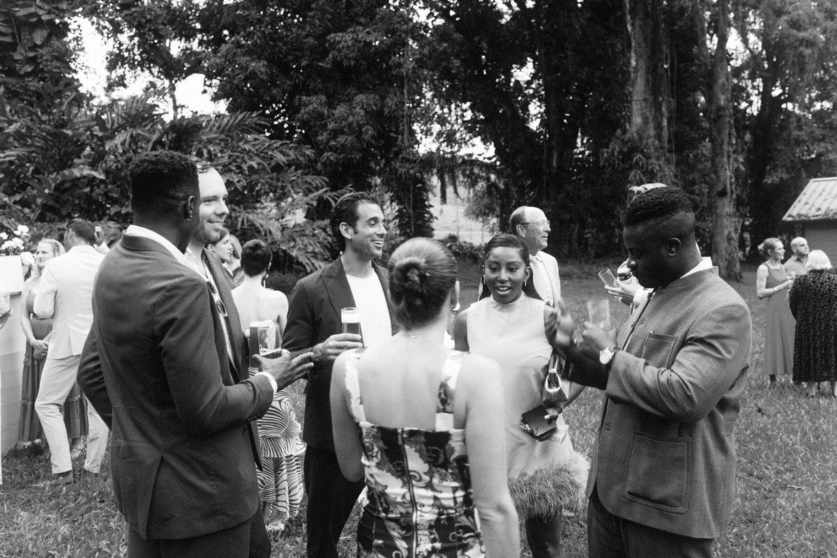fashionable young guests during cocktail hour at a wedding in Maui Hawaii
