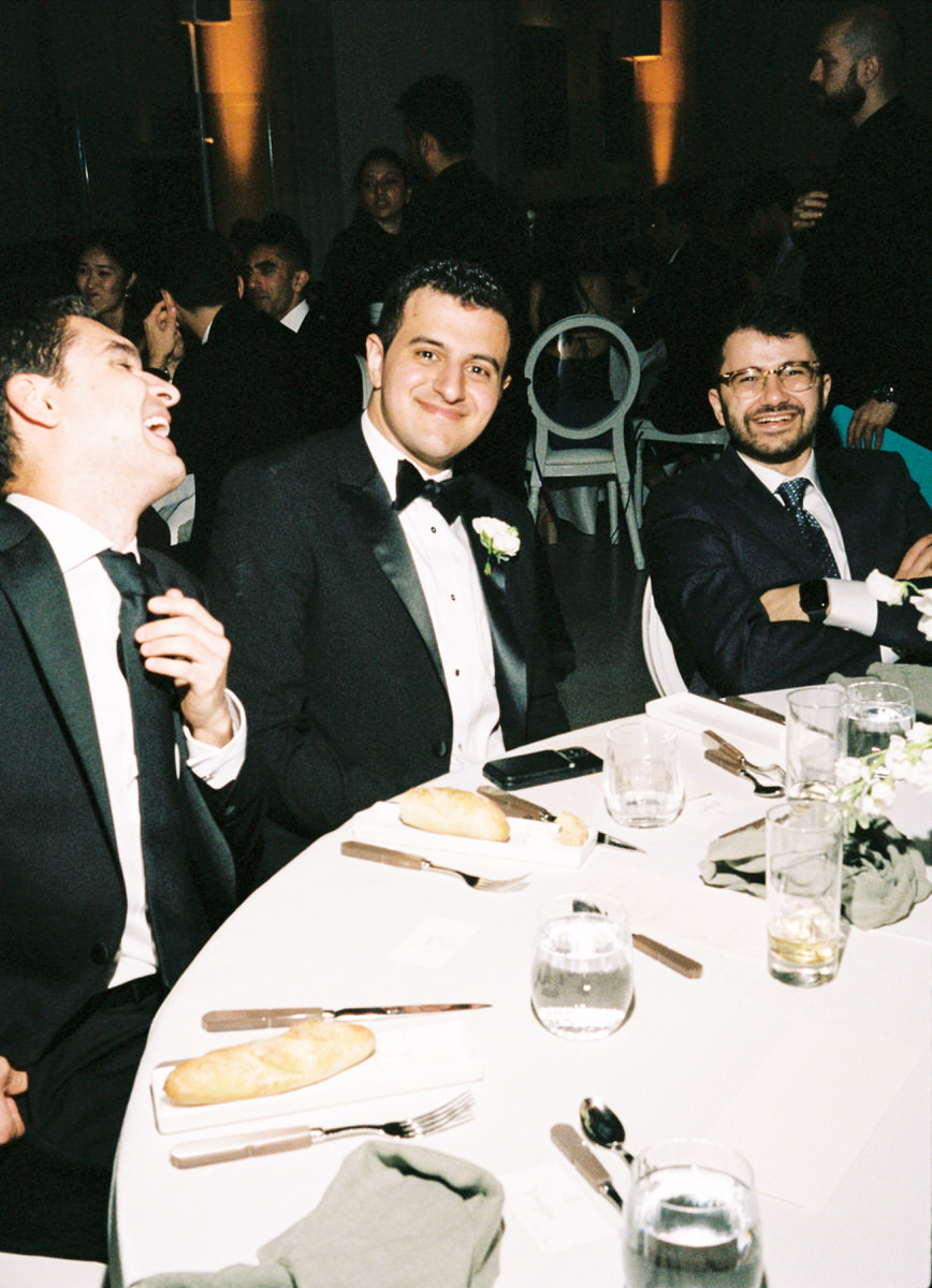 guests enjoying a wedding reception at the AGO captured on 35mm film