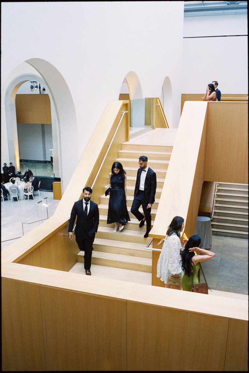 35mm film photo of guests entering a wedding reception at the AGO Art Gallery of Ontario