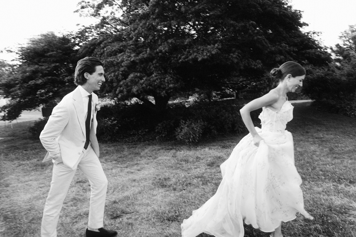 cinematic capture of wedding couple walking together during golden hour at UBC Botanical Garden