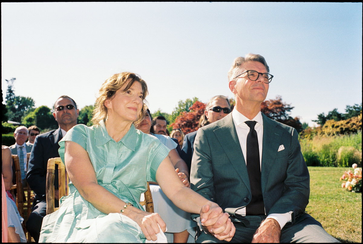 35mm photo of proud parents during a wedding ceremony at UBC Botanical Garden