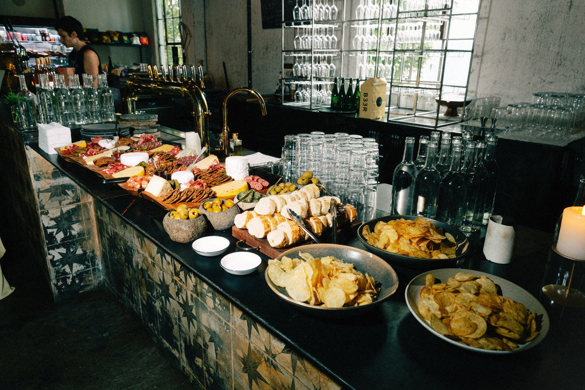 charcuterie spread on the bar inside la fabrique st george winery in vancouver