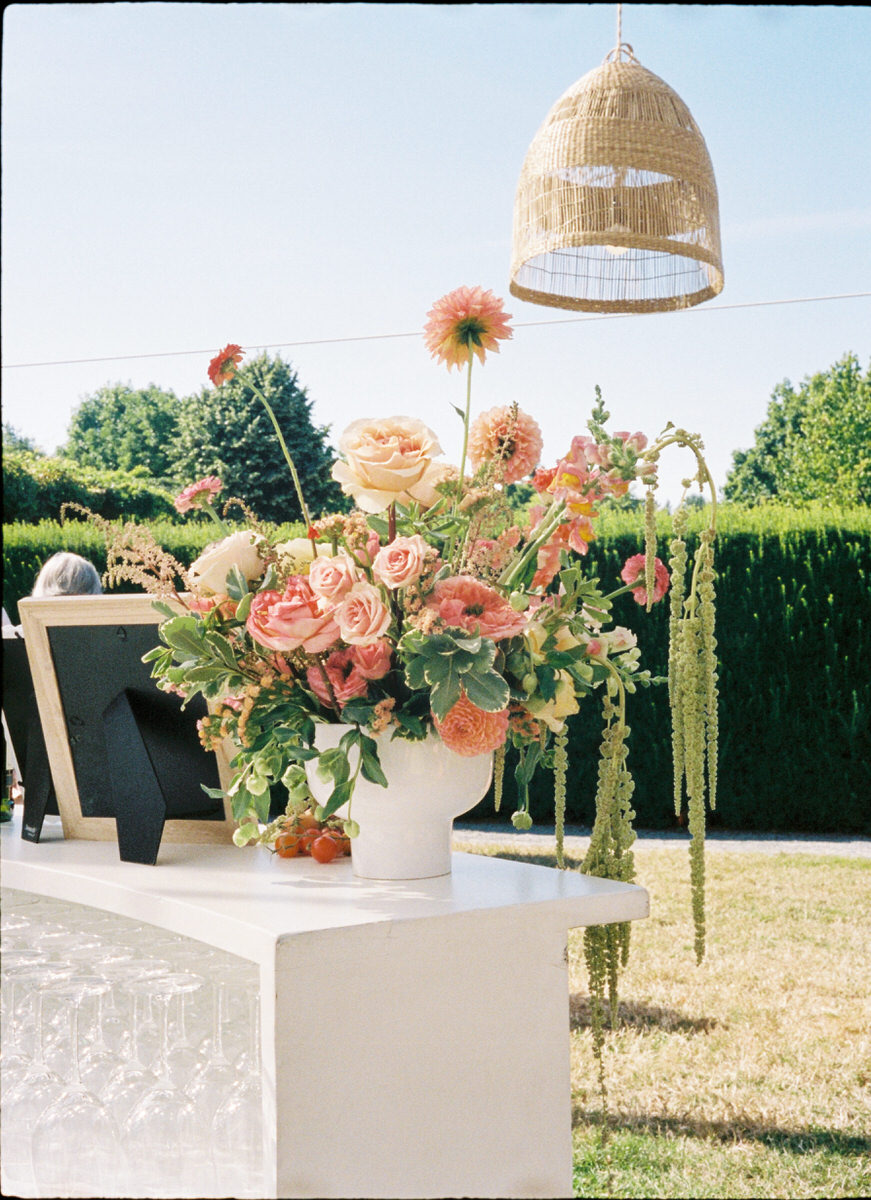 35mm film photo of a peach floral arrangement by Blossom and Vine
