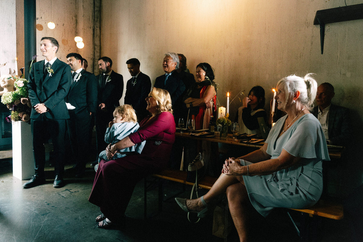 guests during an intimate wedding ceremony at la fabrique st george winery in vancouver