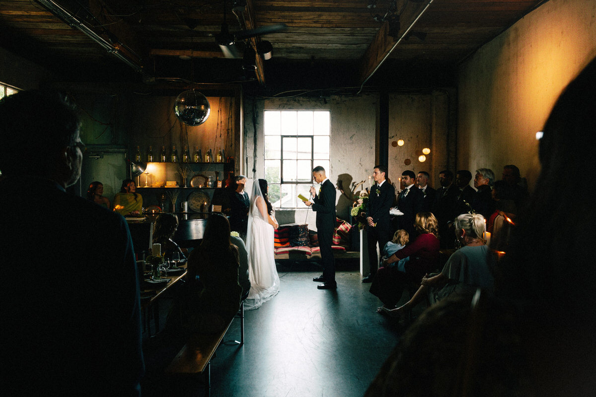 moody atmospheric lighting on fully display for a wedding ceremony at la fabrique st george