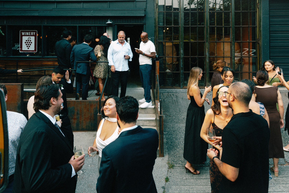 guests enjoying an outdoor wedding cocktail reception at la fabrique st george in vancouver