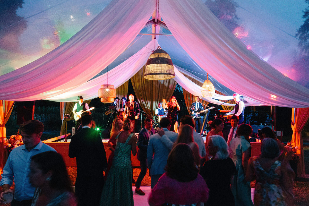 colour lights up a tented wedding reception at UBC Botanical Garden