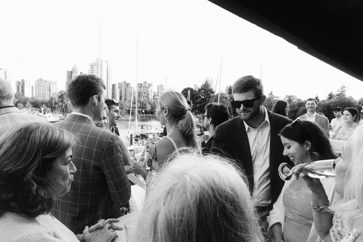 guests enjoying drinks during a wedding dinner reception at Vancouver Rowing Club